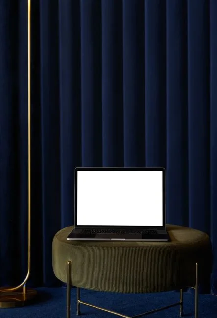hero-img A miniature shopping cart placed on a laptop keyboard symbolizing online shopping and e-commerce.